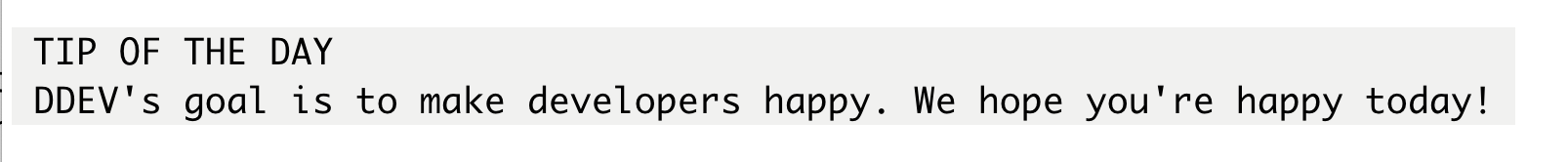 A DDEV 'tip of the day' saying 'DDEV's goal is to make developers happy. We hope you're happy today.'